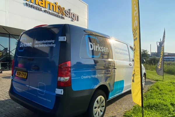 Blauwe bedrijfsbus wrap